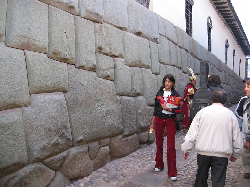 0806120045.JPG - Day 6, Thursday, June 12, Cuzco. Twelve cornered stone.  Notice the guardian eyeing me suspiciously.