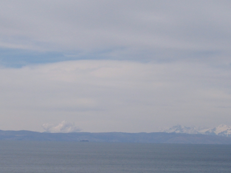 0806150022.JPG - Day 9, Sunday, June 15. Taquile Island, Lake Titicaca.  View of Andes Mountains to the west, Bolivia.
